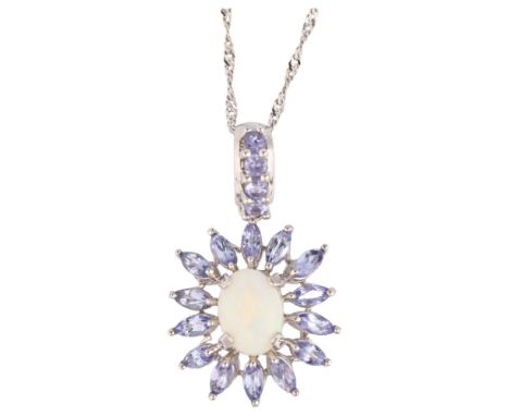 A modern 9ct white gold opal and tanzanite flowerhead cluster pendant necklace, set with oval cabochon opal and marquise-cut 