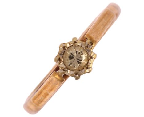 A late 20th century 9ct gold 0.1ct solitaire diamond ring, maker WEG, Birmingham 1980, illusion set with modern round brillia