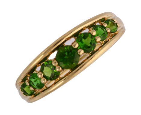 A modern 9ct gold tsavorite garnet half hoop ring, openwork set with round-cut garnets, setting height 6.9mm, size R, 2.6gNo 