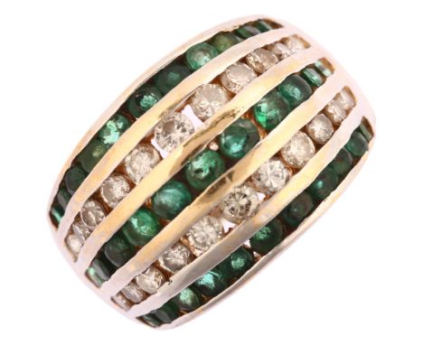 A late 20th century 14ct white gold emerald and diamond bombe ring, maker R&N, channel set with round-cut emeralds and modern