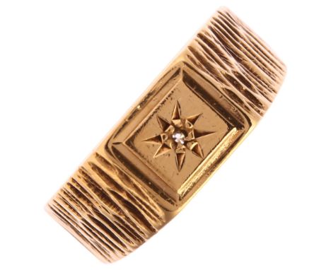 A mid-20th century 9ct gold solitaire diamond signet ring, star set with rose-cut diamond and textured shoulders, setting hei