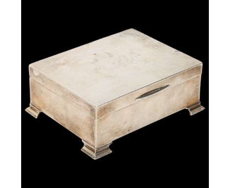 A George VI rectangular silver cigarette box, indistinct hallmarks, engine turned lid, 11.5cm x 9cm, 10.1oz grossEdges have a