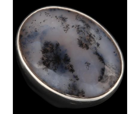 A large sterling silver moss agate dress ring, set with oval cabochon agate, setting height 26.8mm, size O, 16.8gNo damage or