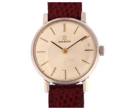 OMEGA - a lady's stainless steel mechanical wristwatch, silver dial with applied gilt baton hour markers, case width 23mm, wo