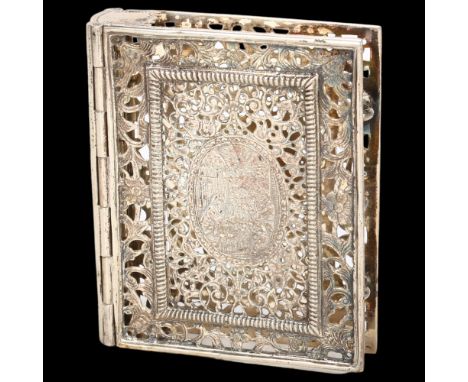 An Antique Dutch silver prayer book cover, allover pierced and engraved decoration with central Nativity scene panels, 8.5cm 