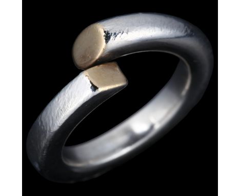 JENS JOHS AAGAARD - a Danish modernist sterling silver and silver-gilt torque ring, band width 3.3mm, size L, 7.1gNo damage o