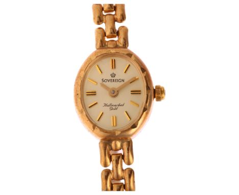 SOVEREIGN - a lady's 9ct gold quartz bracelet watch, silvered dial with applied gilt baton hour markers and 9ct bracelet, cas