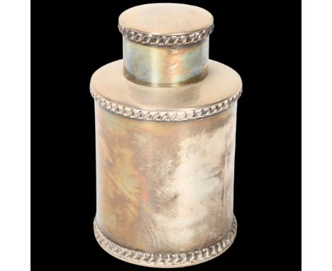 A Victorian silver tea caddy, Goldsmiths & Silversmiths Co Ltd, London 1895, plain cylindrical form with gadrooned rim, 12cm,