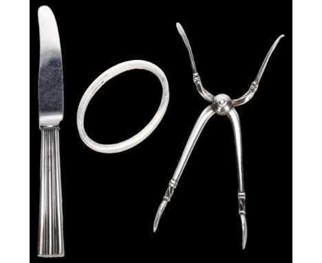 Various Danish silver, including sugar tongs, napkin ring and butter knife (3)No damage or repair, only light surface wear 