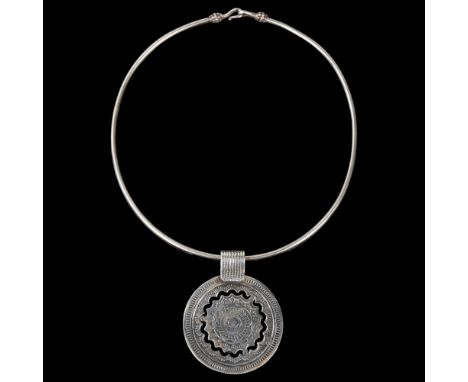 An Egyptian silver talisman pendant necklace, on silver neck torque, pendant 62.3mm, 47gNo damage or repairs, only light surf