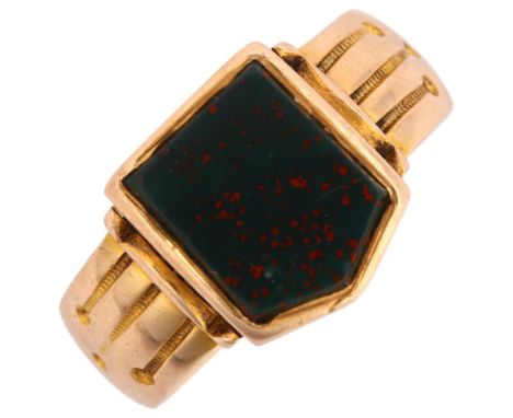 A Victorian 15ct gold bloodstone shield signet ring, with engine turned shoulders, maker's marks EV, Chester 1889, setting he