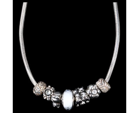 PANDORA - a sterling silver snake link charm necklace, with 7 silver charms, 42cm, 53.4gNo damage or repairs, only light surf