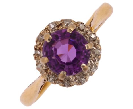 A mid-20th century 18ct gold amethyst and diamond circular cluster ring, set with round step-cut amethyst, old and rose-cut d