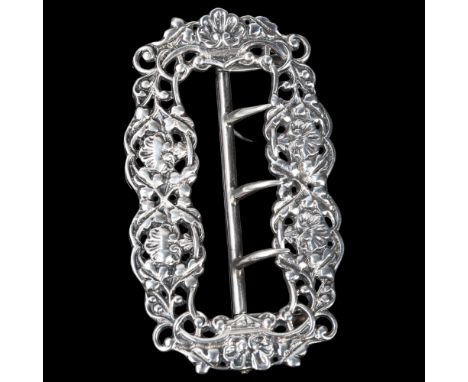 A Victorian silver nurse's belt buckle, John Millward Banks, Birmingham 1892, relief cast and pierced floral decoration, 8cm,