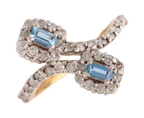 A modern 9ct gold aquamarine and diamond double-cluster crossover ring, maker KJ, Birmingham 2006, set with rectangular step-