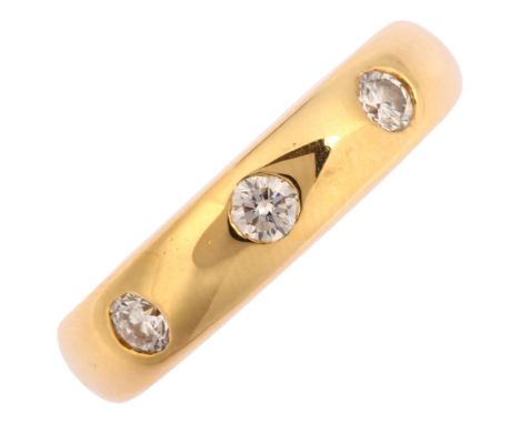 A heavy modern 18ct gold three stone diamond band ring, maker DOM, set with modern round brilliant-cut diamonds, total diamon