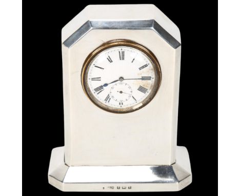 An Art Deco George V silver mantel clock, Spurrier & Co, Birmingham 1924, white enamel dial with Roman numeral hours markers,