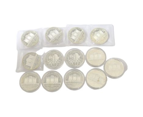 13 x Austrian 1oz fine silver Philharmonic coins, comprising 5 x 2010, and 8 x 2013All have light surface wear 