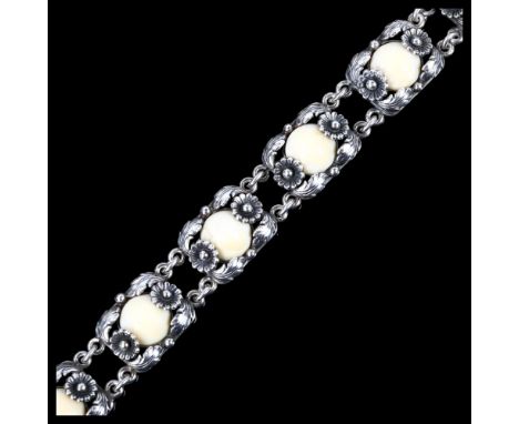 NIELS ERIK FROM - an Art Nouveau Danish stylised sterling and silver marine ivory floral panel bracelet, length 19cm, 33.4gNo