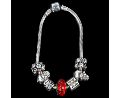 PANDORA - a sterling silver snake link charm bracelet with 7 silver charms, 19cm, 39.9gNo damage or repairs, only light surfa