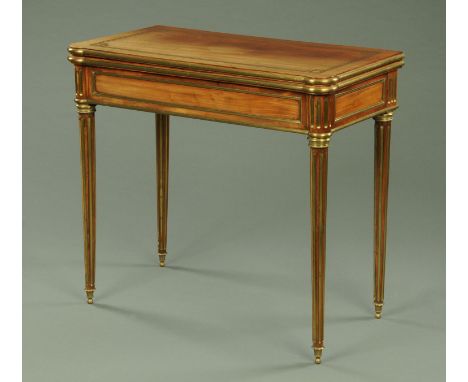 A fine quality Louis Philippe brass mounted mahogany card table, with swivel turnover top inlaid with key pattern brass strin