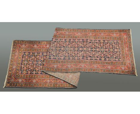 A Turkoman runner, last quarter 20th century, with multiple line border and centre rectangular panel with repeating decoratio