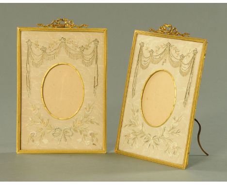 A pair of Edwardian gilt brass photograph frames, one bearing label for Sheffield Goldsmith's Co. Ltd., Watchmakers to The Ad