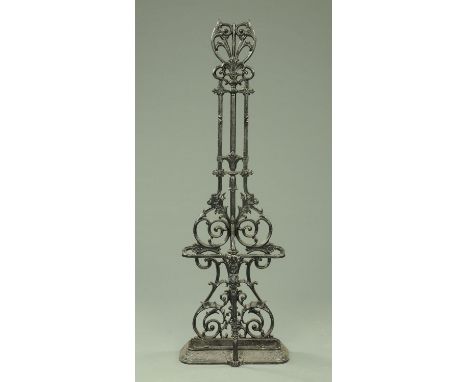 A Victorian cast iron hall stick stand, with drip tray.  Height 147 cm, width 23 cm.  CONDITION REPORT: The stand is in very 
