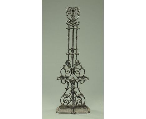 A Victorian cast iron hall stick stand, with drip tray.  Height 147 cm, width 23 cm.  CONDITION REPORT: The stand is in very 