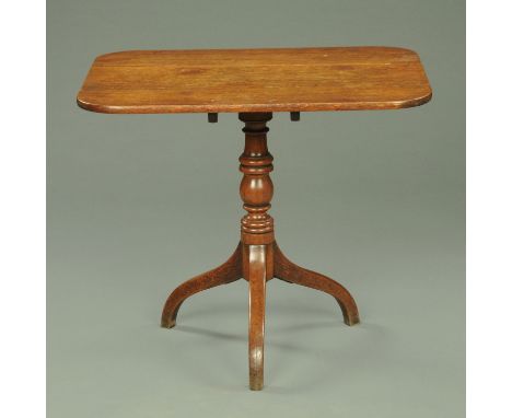 A Victorian mahogany tripod occasional table, with snap action, rounded corners and raised on a turned column with three down