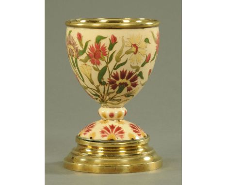 A Zsolnay Pecs oil lamp base, circa 1878-1898, typical Zsolnay floral decoration against a cream ground, printed and impresse