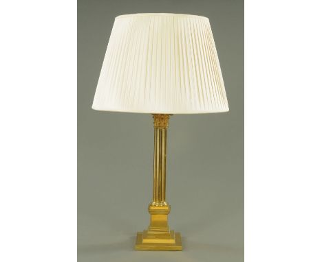 A Victorian style brass column table lamp, with Corinthian capital.  Height excluding light fitting and shade 47 cm.