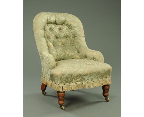 A late Victorian upholstered low chair with button back, and a Victorian style upholstered button back armchair, each with br