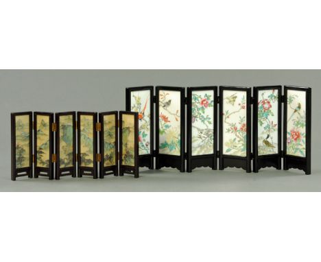 Two Chinese table screens, mid 20th century, one with six porcelain panels with a variety of birds amongst blossoming flowers