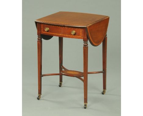 An Edwardian inlaid mahogany twin drop flap side table, with single drawer and raised on tapered legs of square section termi