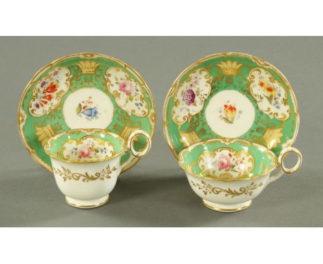 An Minton porcelain tea cup and coffee cup with matching saucers, early to mid 19th century, painted with hand painted floral