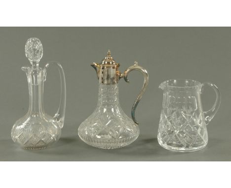 A cut glass and silver plate mounted claret jug, a lead crystal decanter and a cut glass water jug, tallest 31 cm.