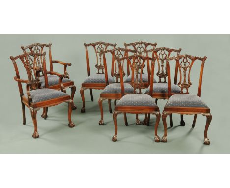 A set of eight Chippendale style mahogany dining chairs, each with yoke shaped top rail, pierced splat back, drop in seat uph