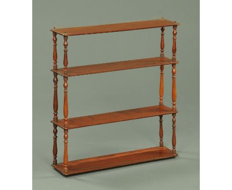 A Victorian mahogany four tier open shelf unit.  Width 66 cm.  CONDITION REPORT: The shelf unit is structurally sound.  The t