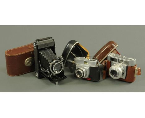Three vintage cameras, to include two Zeiss Ikon and a Beirette 35 mm camera, all in fitted cases.