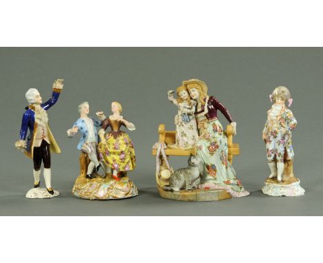 Four Continental porcelain figures, circa 1900 and later, to include a young lady with daughter seated upon a bench and cat t