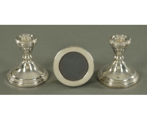 A pair of silver dwarf candlesticks, Adie Brothers, Birmingham 1956, the sconce with Celtic band decoration, height 10.5 cm, 