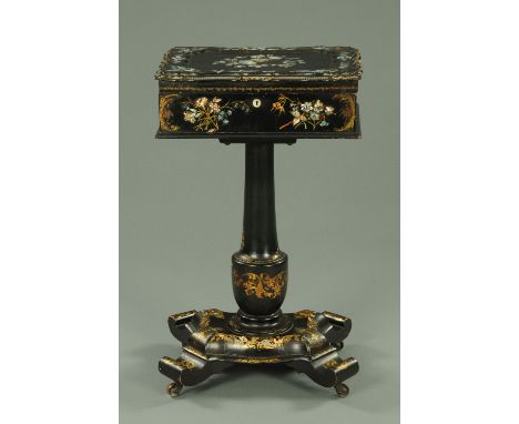 A Victorian papier mache inlaid mother of pearl and gilt sewing box, with fitted interior, centre column, quatreform base and