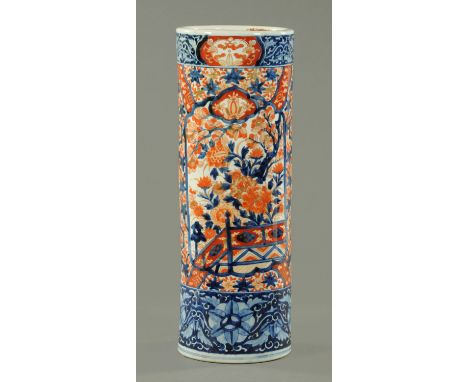 A Japanese Imari stick stand, late Meiji /early Taisho period, in typical Imari palette decorated with chrysanthemums, peony 