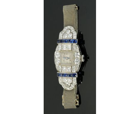 An Art Deco diamond and sapphire set cocktail watch, with Swiss 17 jewel Vertex Revue movement, the case stamped "platinum". 