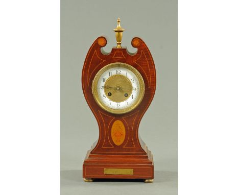 A late Victorian inlaid mahogany mantle clock, with two-train French striking movement by Jules Rolez Ltd., Paris.  Height in