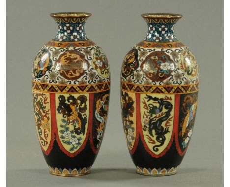 A pair of Japanese cloisonne vases, height 26 cm. CONDITION REPORT: One vase has a large thumb nail chip to the cloisonné sho