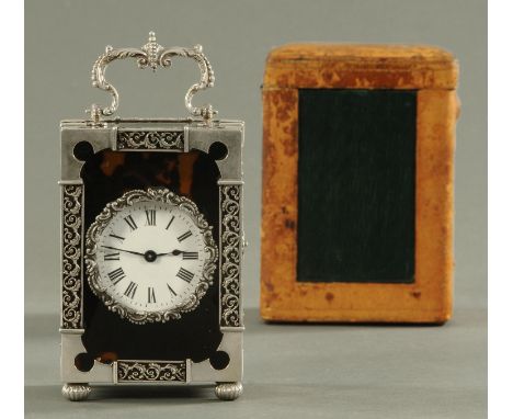 A fine Edwardian silver mounted and tortoiseshell carriage clock, with French single-train movement, London hallmarks for 190