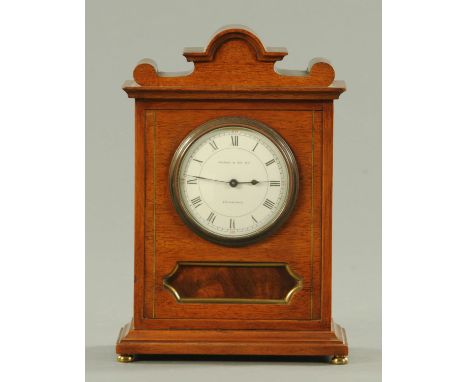 An Edwardian mahogany brass strung mantle clock, with single-train movement.  Width 18 cm. CONDITION REPORT: The clock winds.