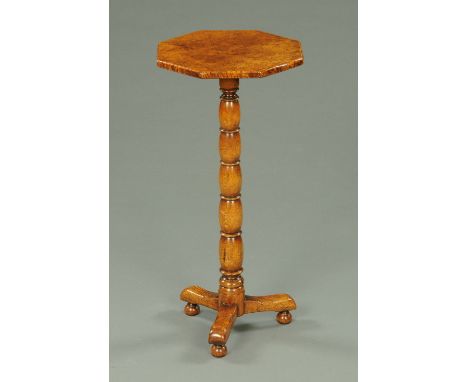 A Chapman's Siesta burr elm tripod table, raised on a turned oak support, with plaque to underside.  Width 35 cm. 